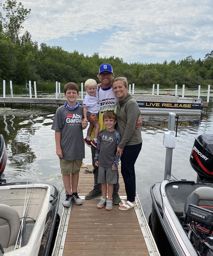 Eric Storms at the dock with his family